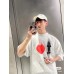 Balenciaga Beige T-Shirt with Abstract Graphic