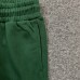 DENIM TEARS COTTON WREATH SWEATPANTS DARK GREEN