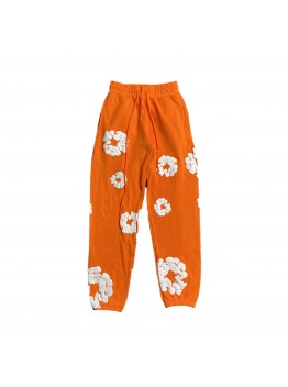 DENIM TEARS COTTON WREATH SWEATPANTS ORANGE