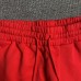 DENIM TEARS COTTON WREATH SWEATPANTS RED