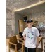 Dior T-Shirt with Floral Graphic Design