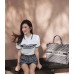 Christian Dior "Striped Logo" Polo Shirt