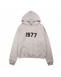 FEAR OF GOD ESSENTIALS "1977" HOODIE STONE GREY