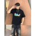 Gucci Black T-Shirt with Pink Dinosaur Graphic
