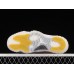 AIR JORDAN 11 LOW YELLOW SNAKESKIN WHITE