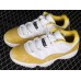 AIR JORDAN 11 LOW YELLOW SNAKESKIN WHITE