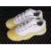 AIR JORDAN 11 RETRO LOW YELLOW SNAKESKIN WHITE