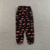 SP5DER SEX AOP SWEATPANTS BLACK
