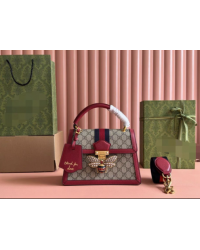 Gucci handbag with metal bee decoration