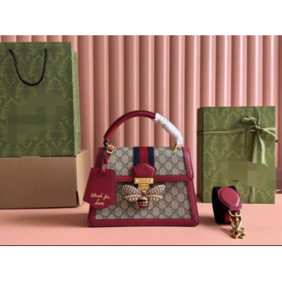Gucci handbag with metal bee decoration