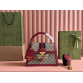 Gucci handbag with metal bee decoration