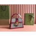 Gucci handbag with metal bee decoration
