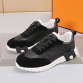 Hermès Black Leather Sneakers